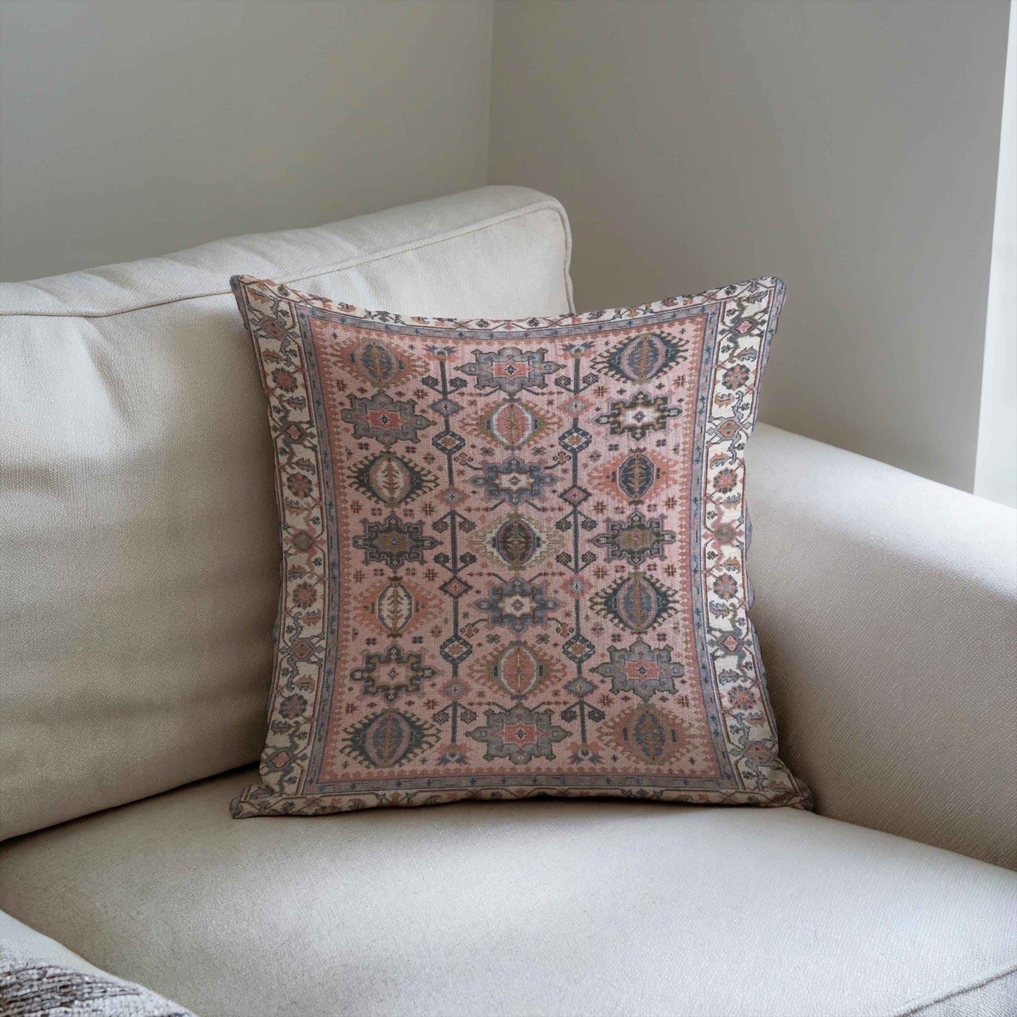 Anatolian Inspired throw pillow with rug-style pattern styled on a sofa or bed