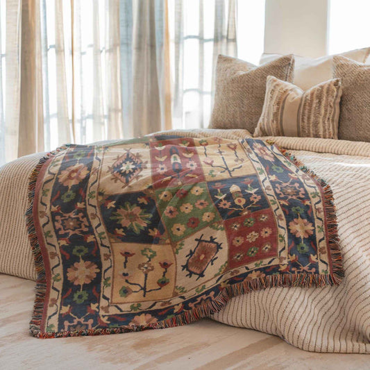 Caucasian Rug Inspired woven blanket with geometric pattern styled for layered home decor
