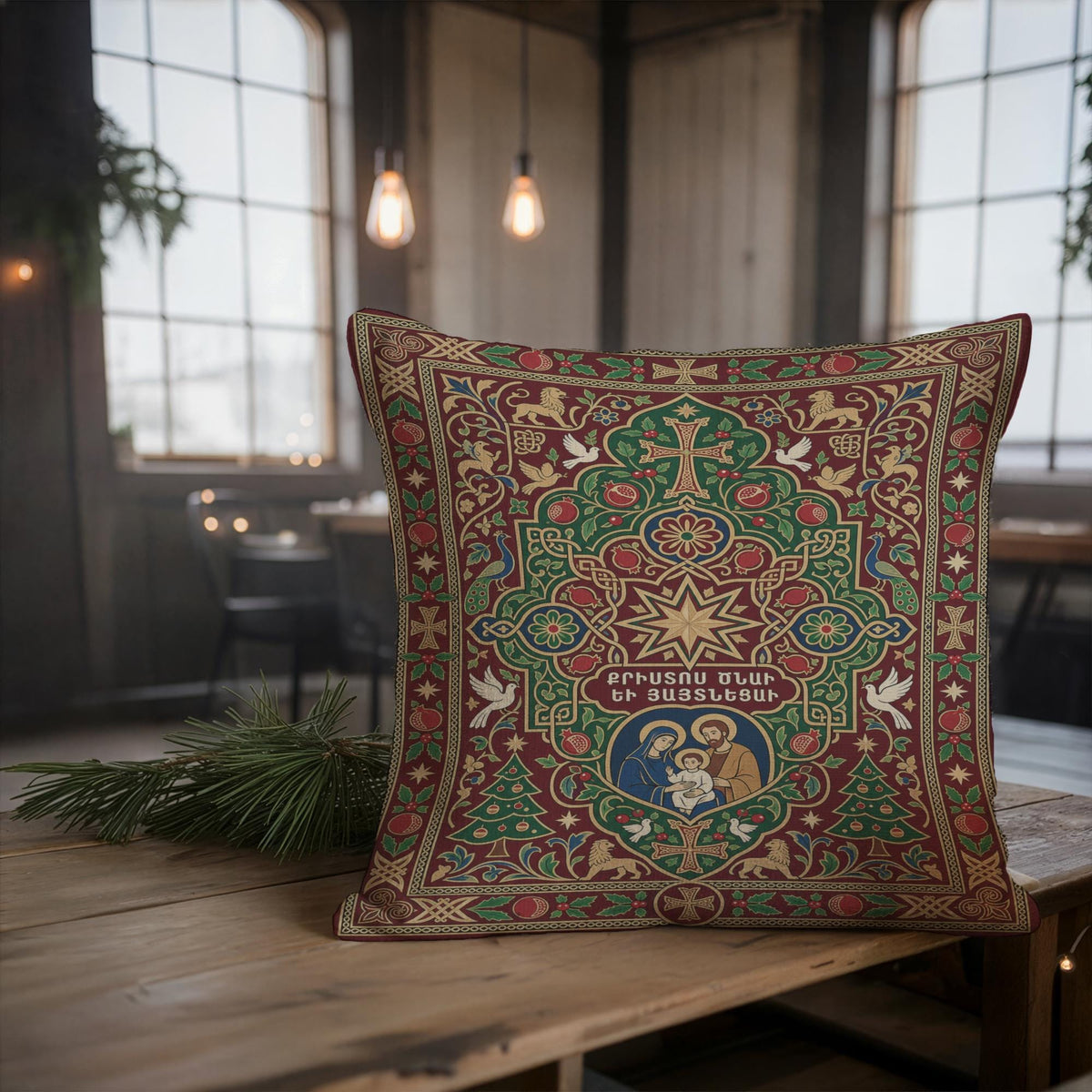 Armenian Nativity pillow with star and doves resting on a wooden table