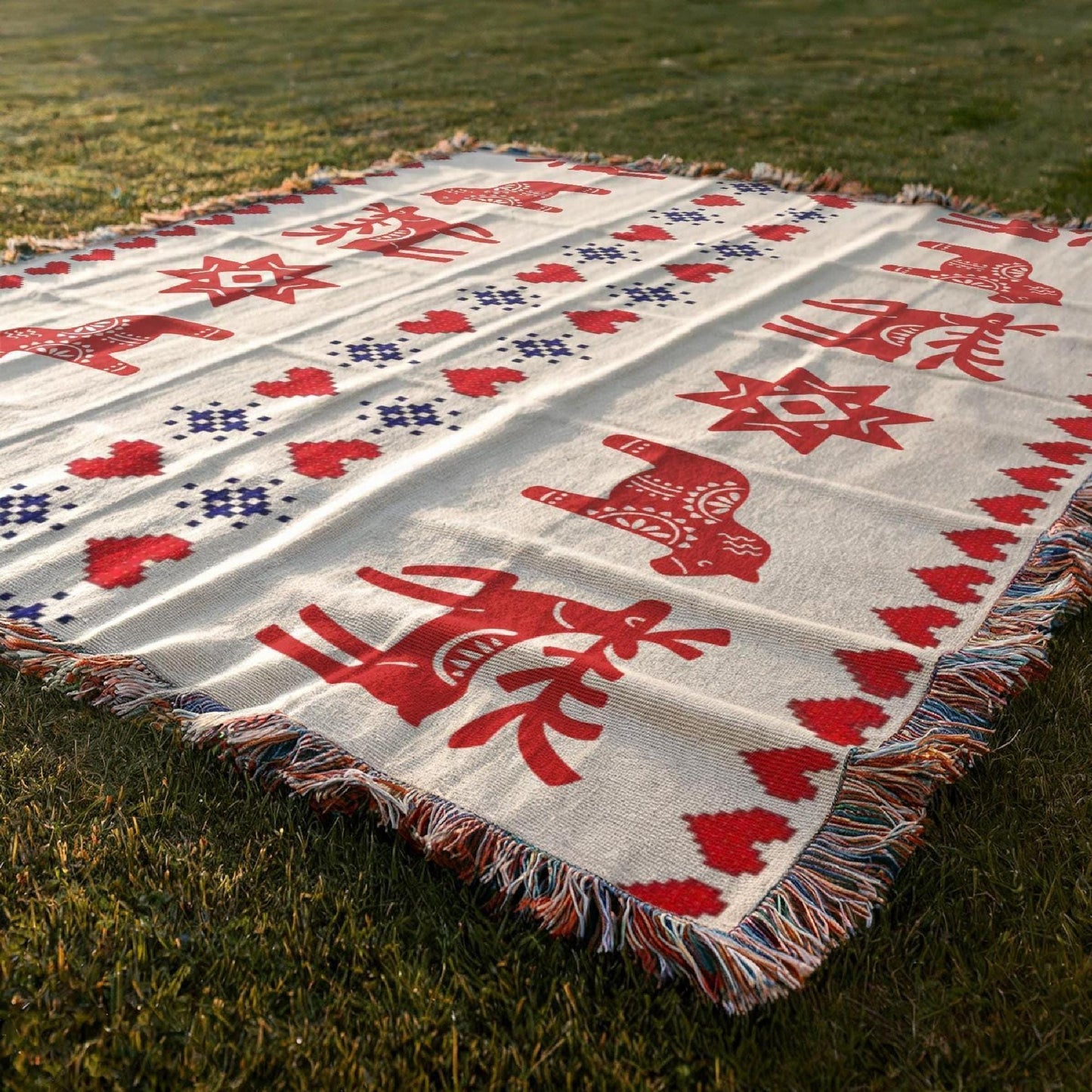 Scandinavian Inspired woven blanket with rug-style pattern styled for layered home decor