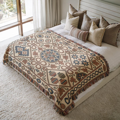 Rust and teal geometric woven cotton throw blanket with fringed edges