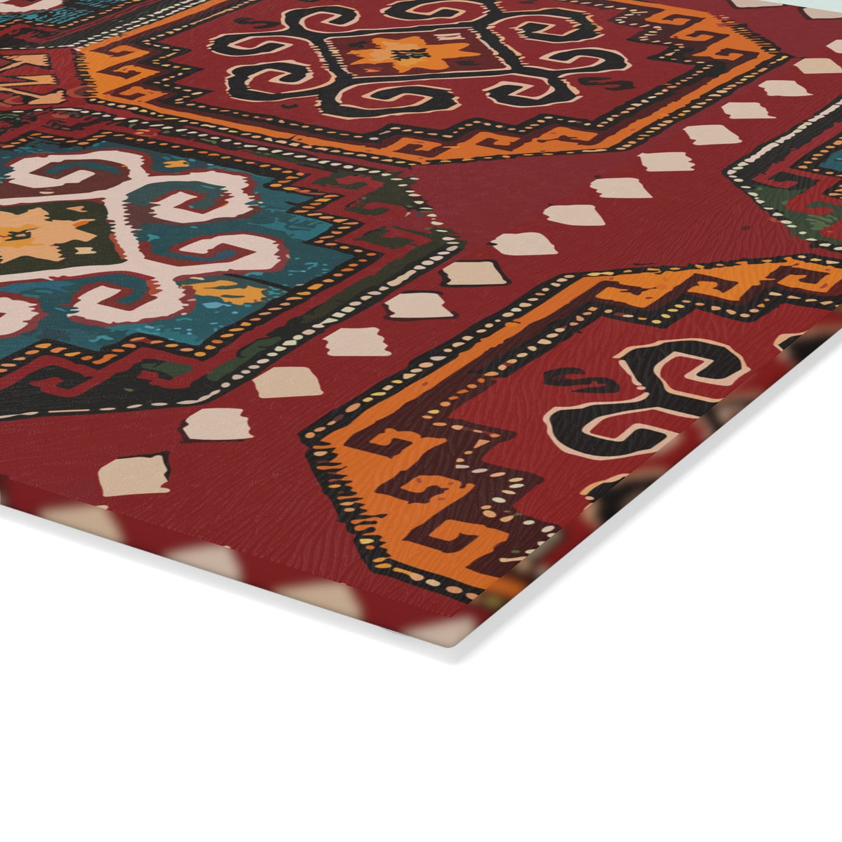 Red and gold Armenian rug motif cutting board seen from above on a kitchen counter