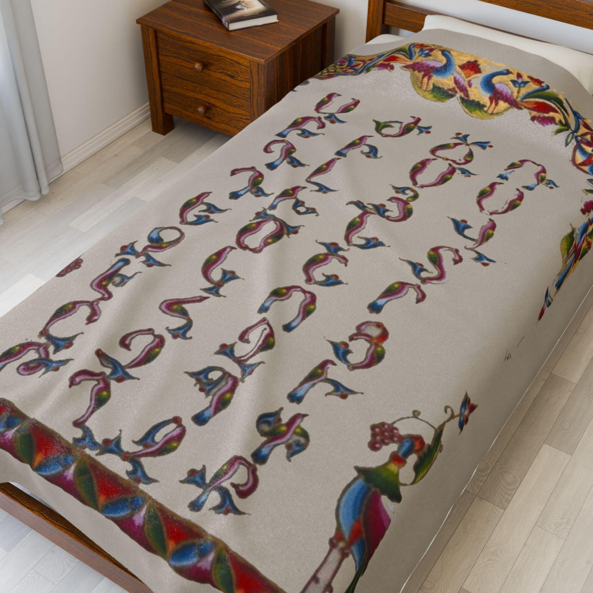 Armenian alphabet plush blanket, letters in red, blue, gold and green on cream
