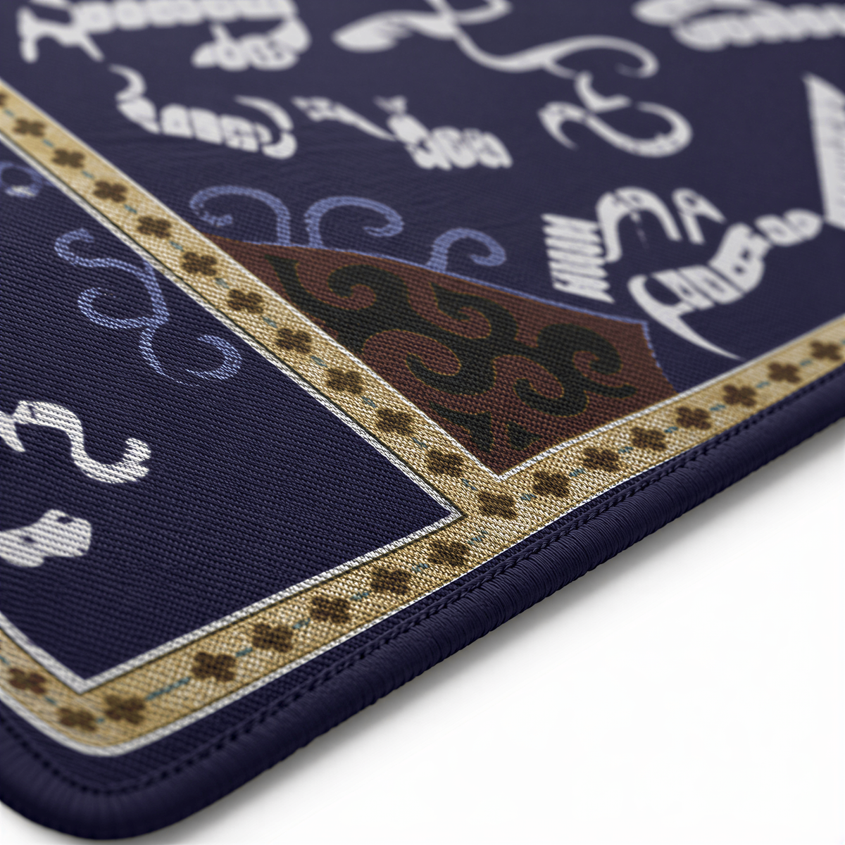 Close view of the white Armenian letters and rust medallions on deep blue