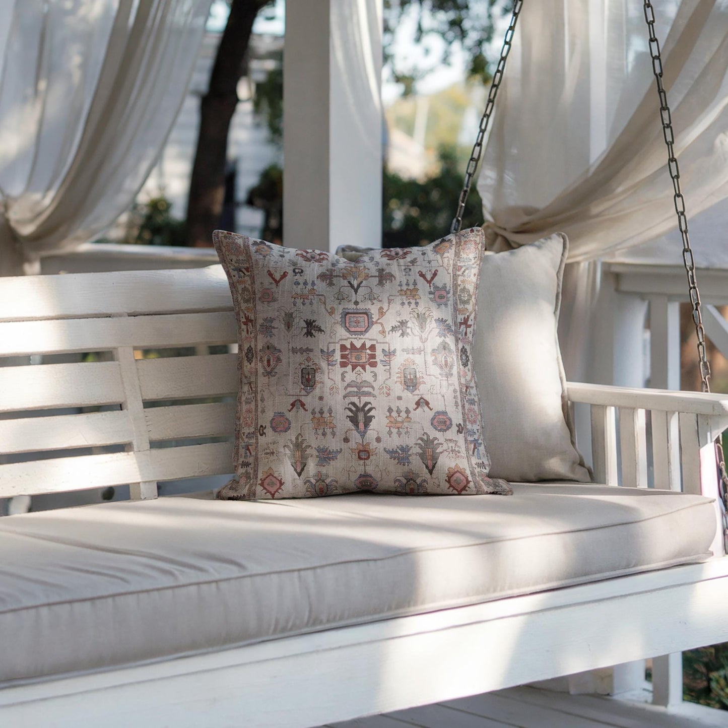 Anatolian Inspired pillow cover with rug-style pattern styled on a sofa or bed