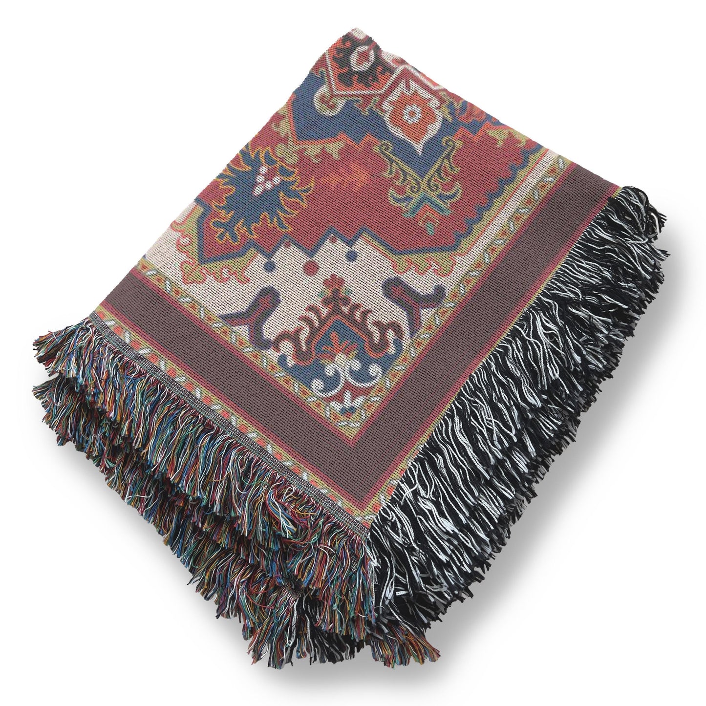 Moroccan Inspired woven blanket with rug-style pattern styled for layered home decor