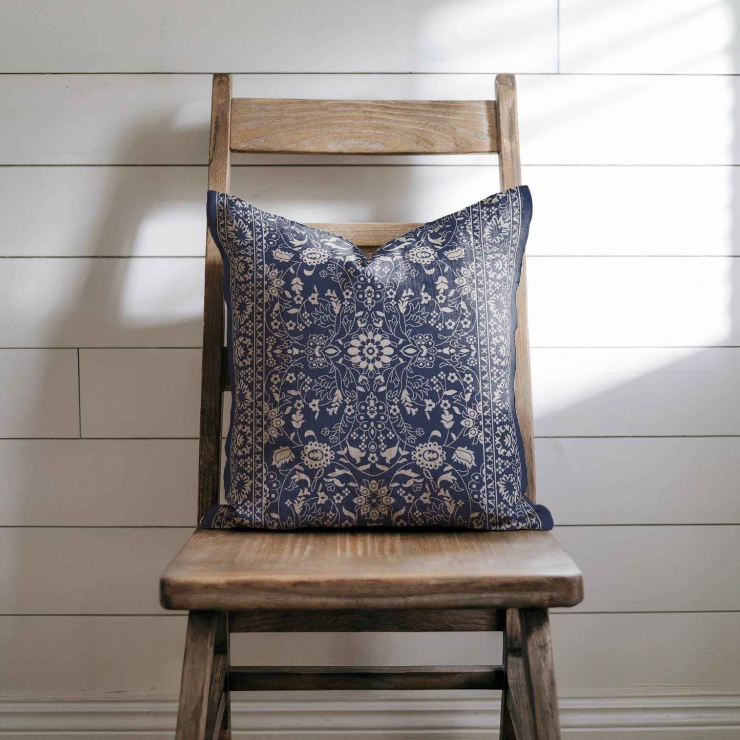 Moroccan Inspired throw pillow with floral pattern styled on a sofa or bed