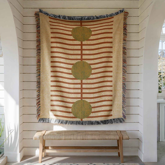 Scandinavian Inspired woven blanket with woven pattern styled for layered home decor