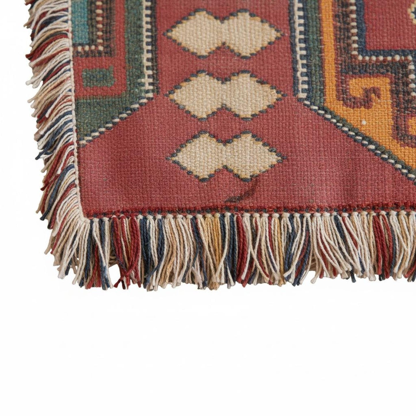 Caucasian Rug Inspired woven blanket with geometric pattern styled for layered home decor