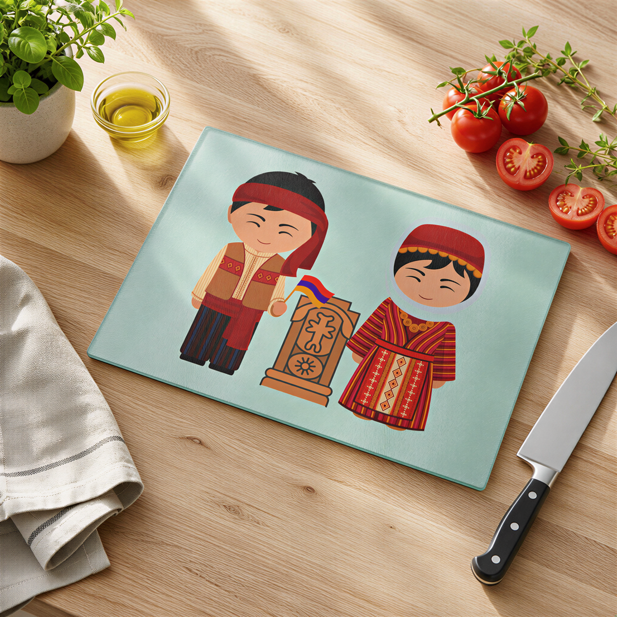 Armenian khachkar cutting board on a wood counter with tomatoes, olive oil and a knife