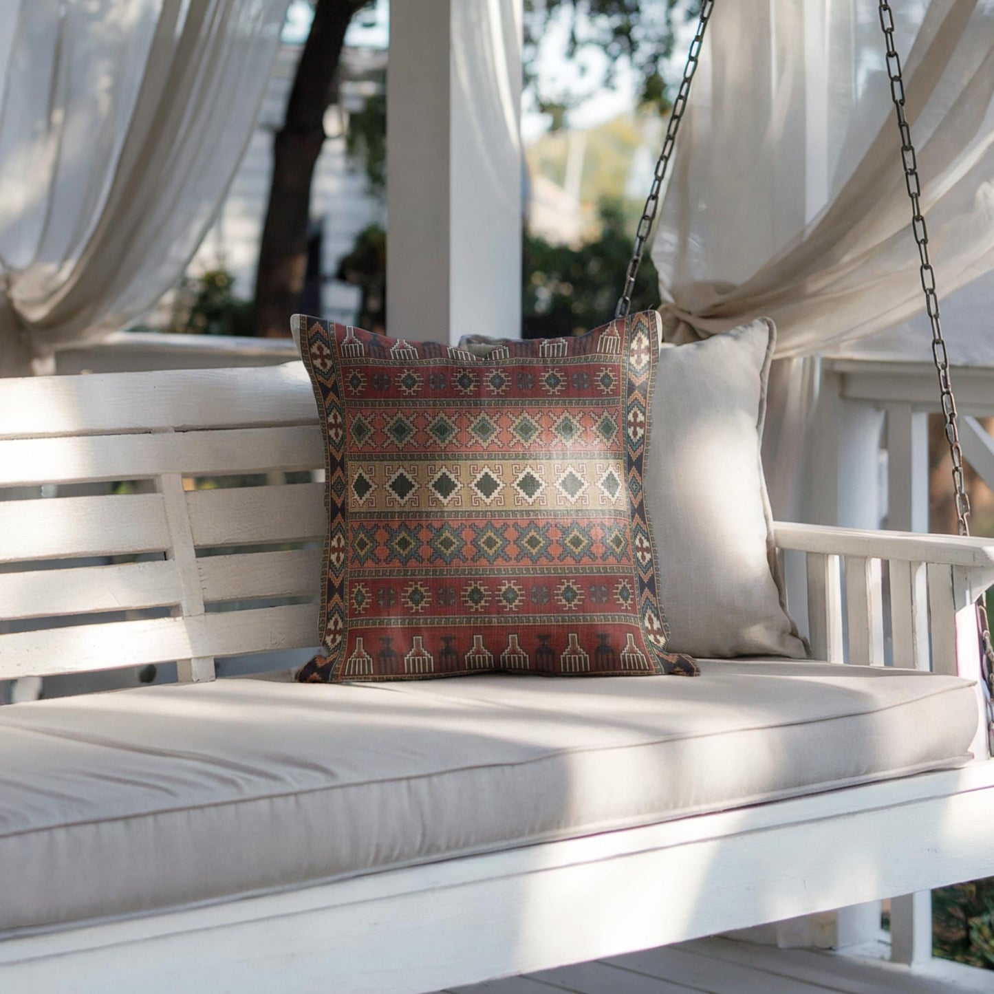 Anatolian Inspired pillow cover with rug-style pattern styled on a sofa or bed