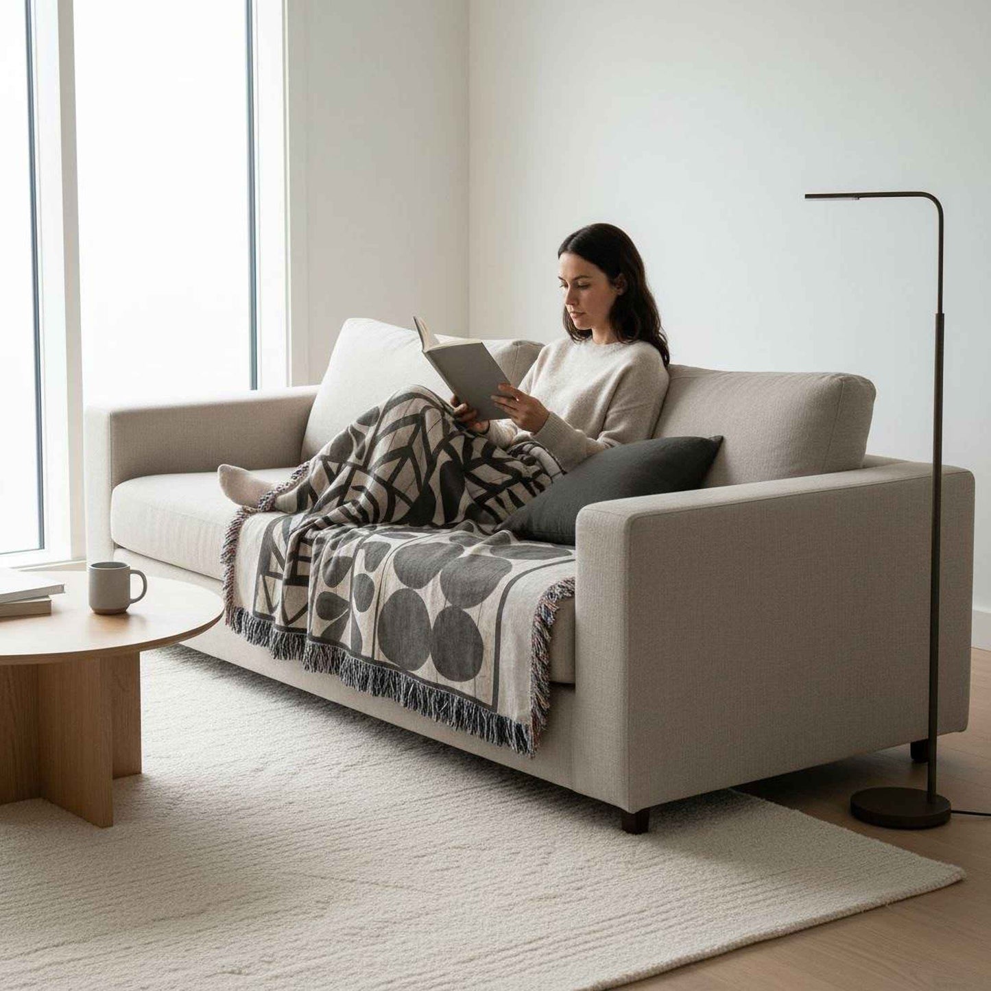 Modern Geometric woven blanket with geometric pattern styled for layered home decor