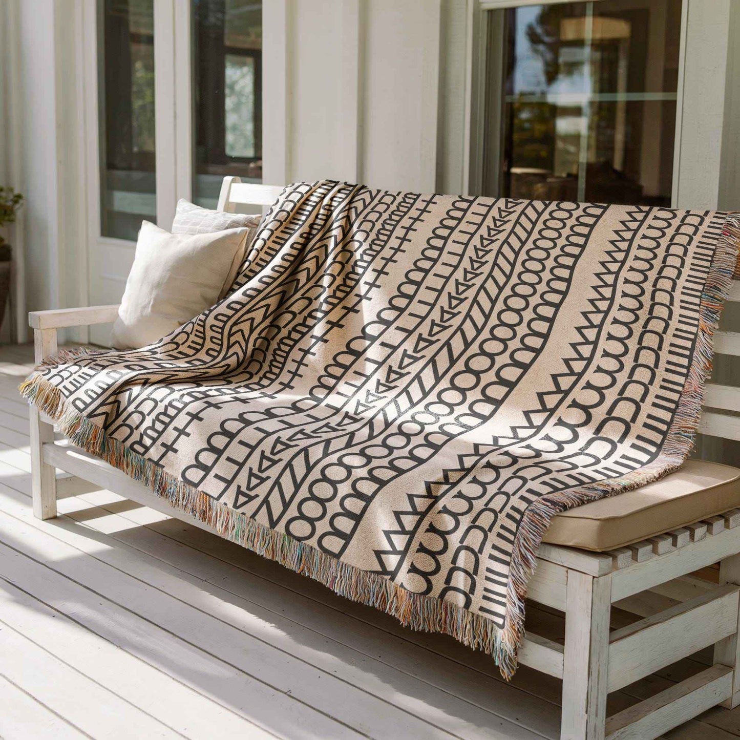 Modern Geometric woven blanket with geometric pattern styled for layered home decor