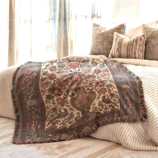 Moroccan Inspired woven blanket with floral pattern styled for layered home decor