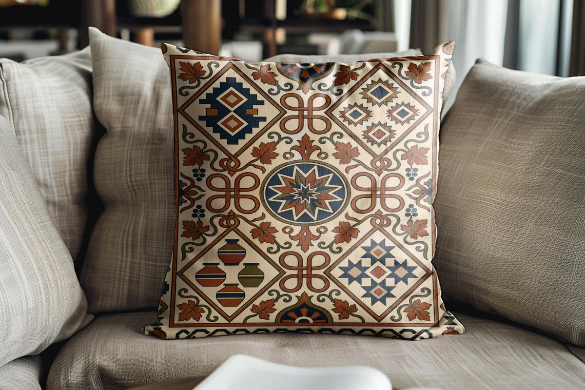 Kilim-style rust and teal pillow on a grey sofa with linen cushions