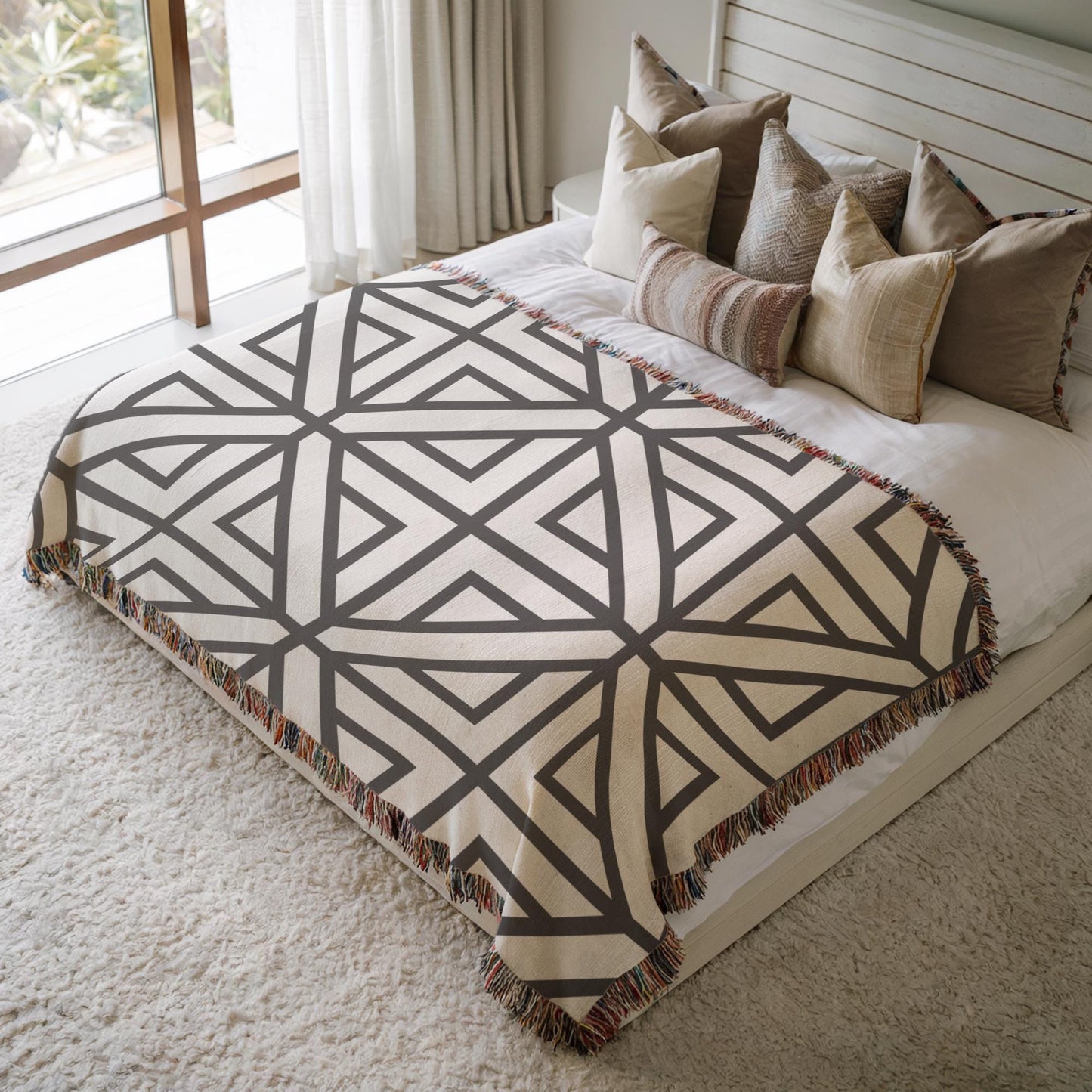 Modern Geometric woven blanket with geometric pattern styled for layered home decor
