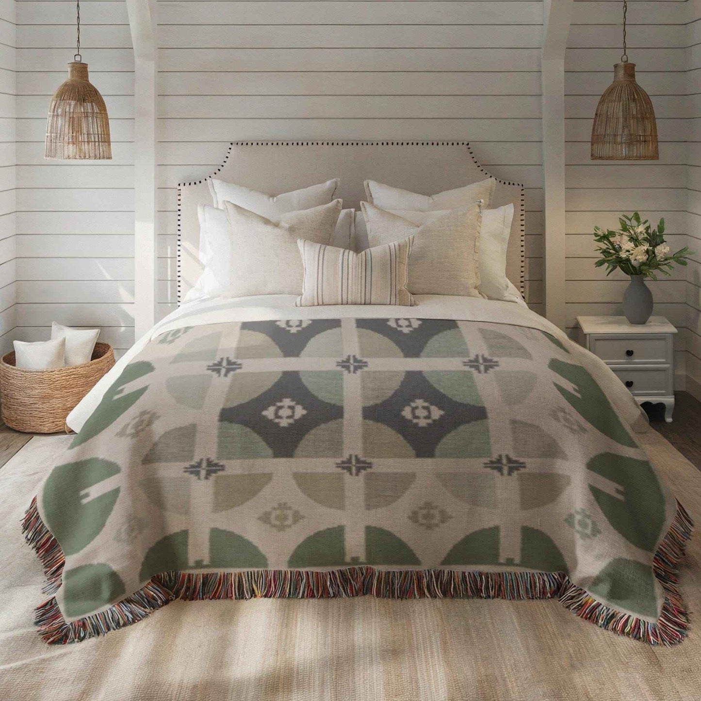 Scandinavian Inspired woven blanket with geometric pattern styled for layered home decor
