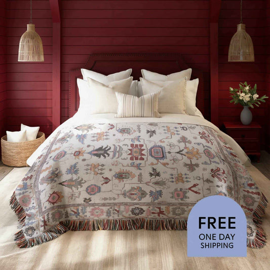 Anatolian Inspired woven blanket with rug-style pattern styled for layered home decor