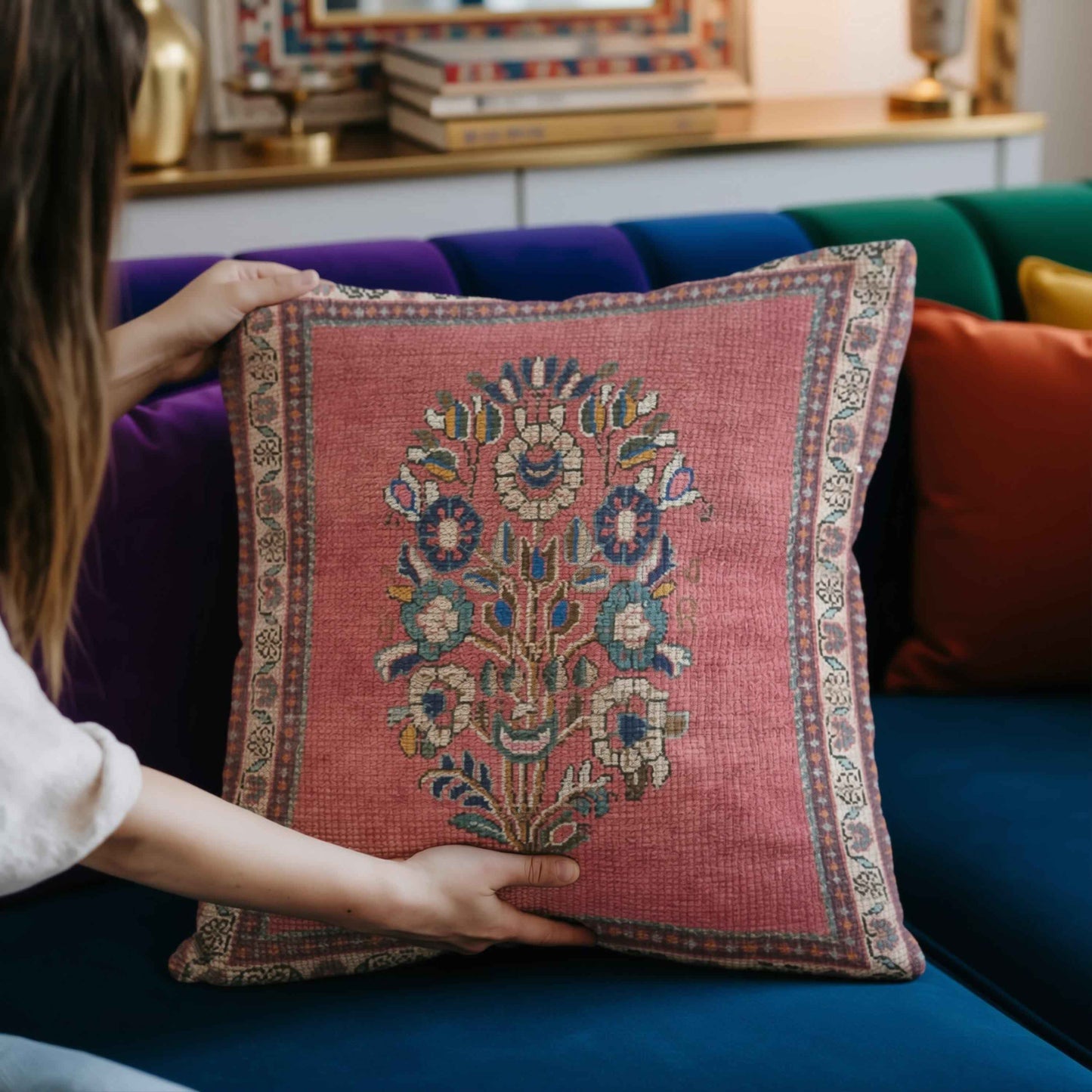Anatolian Inspired throw pillow with floral pattern styled on a sofa or bed