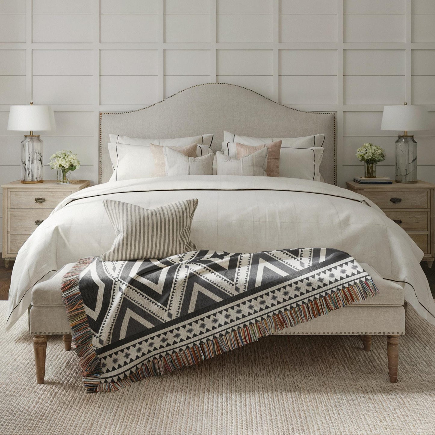 Southwestern woven blanket with geometric pattern styled for layered home decor