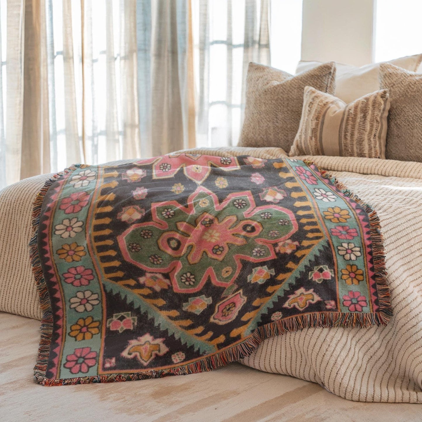 Anatolian Inspired woven blanket with floral pattern styled for layered home decor