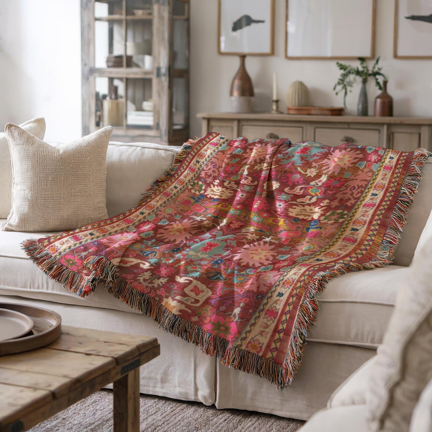 Boho woven blanket with rug-style pattern styled for layered home decor