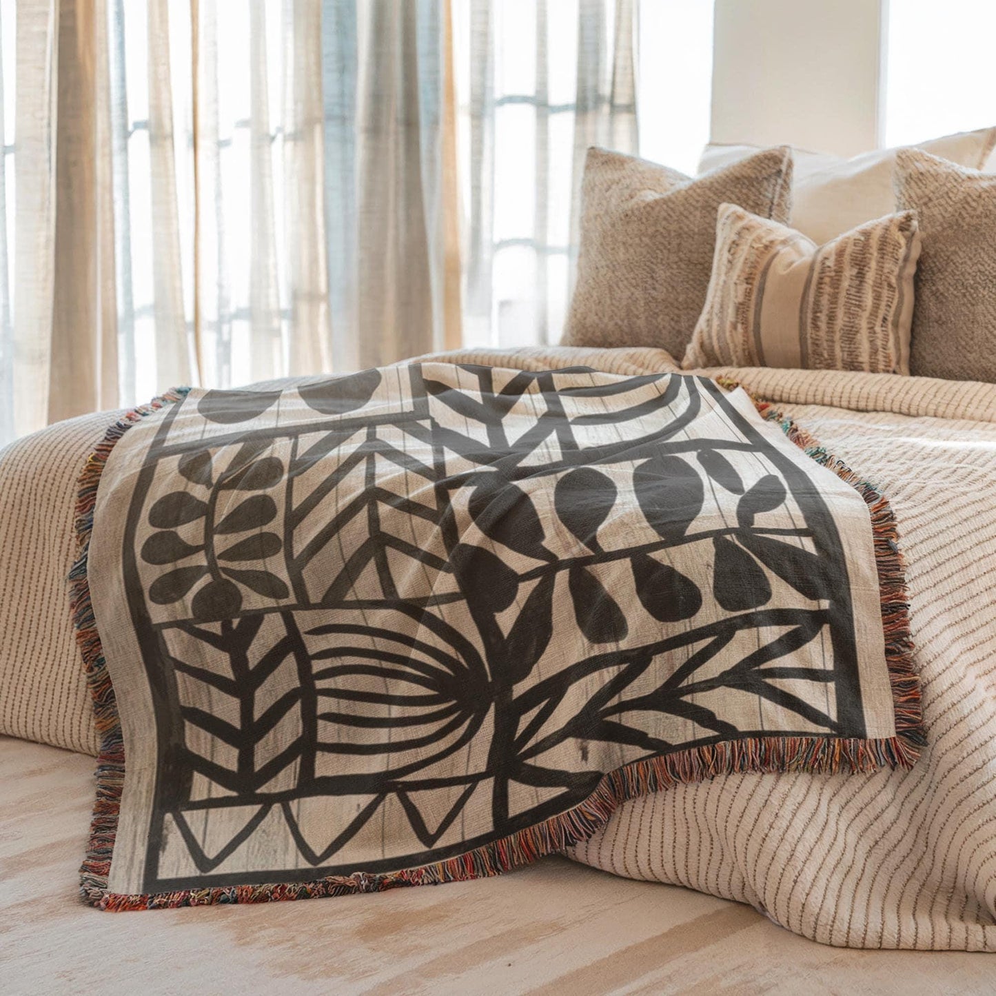 Modern Geometric woven blanket with geometric pattern styled for layered home decor
