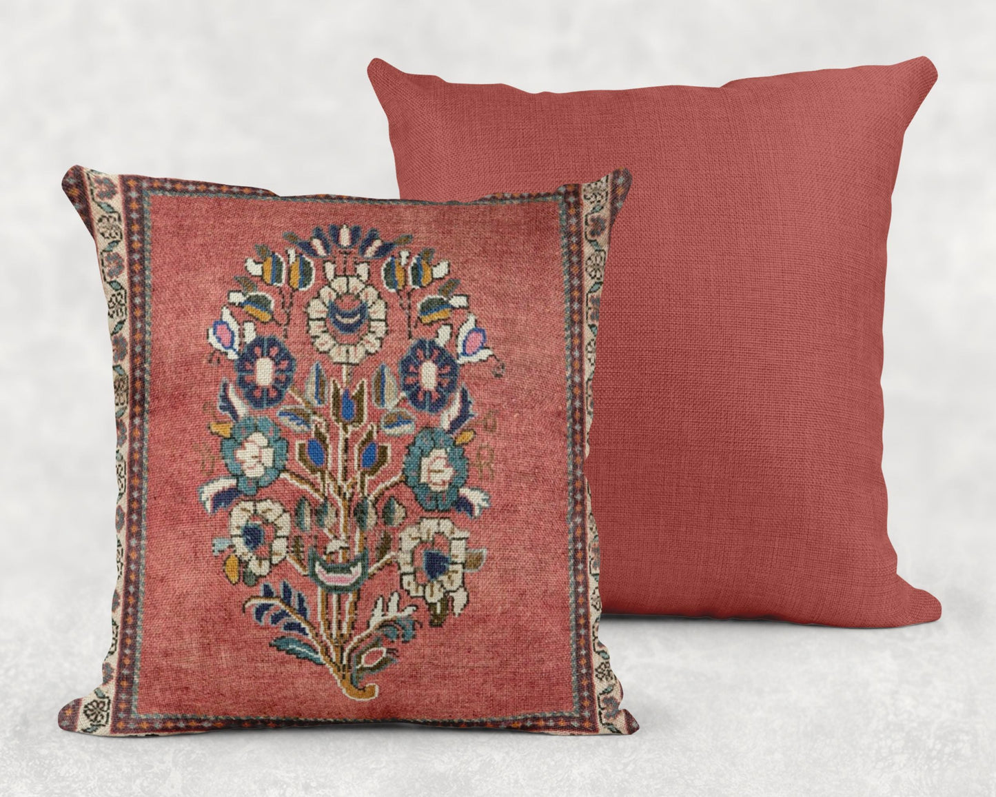 Anatolian Inspired throw pillow with floral pattern styled on a sofa or bed