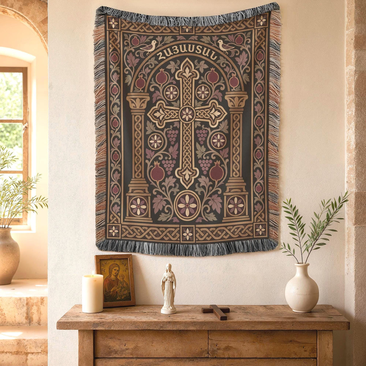 Hayastan woven wall tapestry above a wooden console with a candle and a small figurine