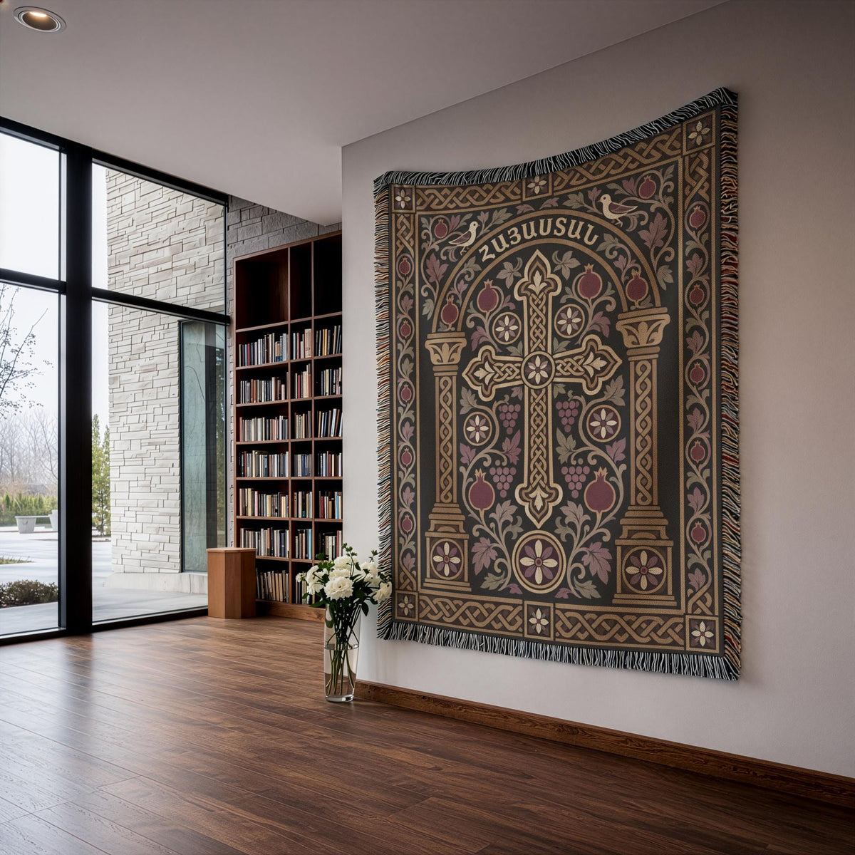 Hayastan khachkar tapestry with doves and columns on a plaster wall beside an arched window and potted plants
