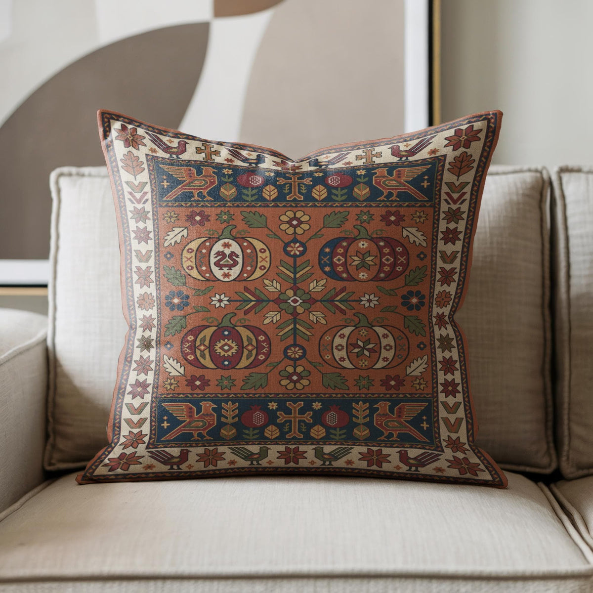 Woven pumpkin pillow on a cream armchair, cream geometric border and navy bird panels