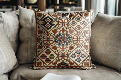 Kilim-style rust and teal pillow on a grey sofa with linen cushions
