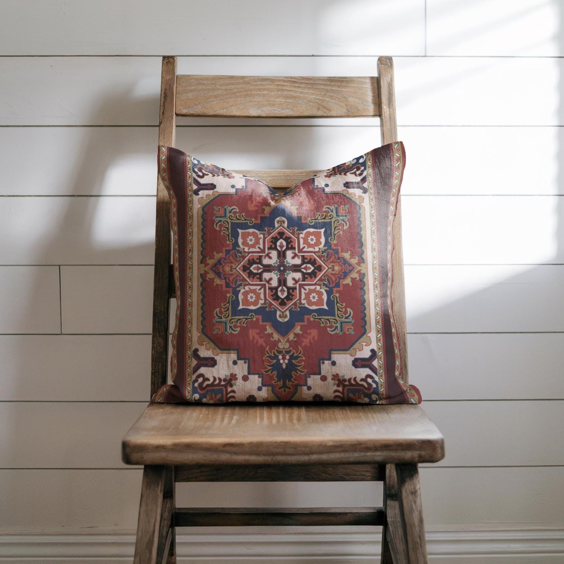 Rust blue woven pillow cover with beige geometric rug-inspired pattern