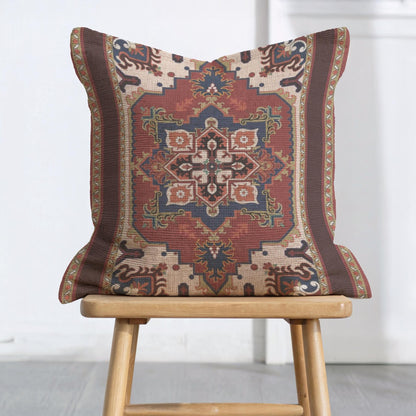 Rust blue woven pillow cover with beige geometric rug-inspired pattern