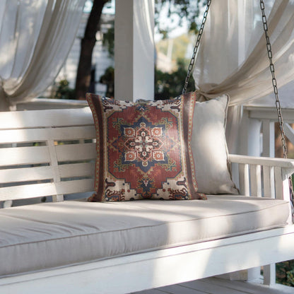 Rust blue woven pillow cover with beige geometric rug-inspired pattern